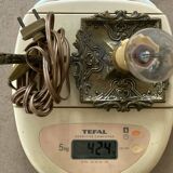 Candle holder with 20th century spelter socket mounted as a flame bulb lamp