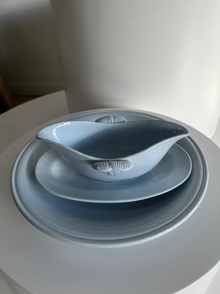 Flat set and light blue saucière earthenware from Montereau