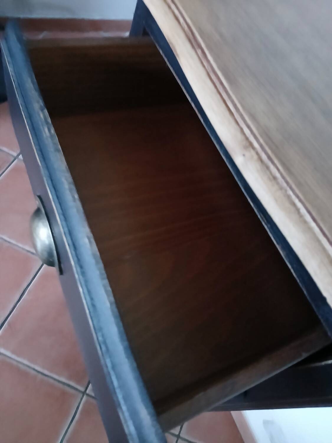 Black painted wooden chest of drawers