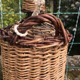 Glass and wicker cylinder