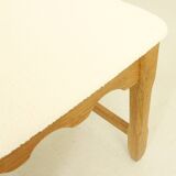 Four oak dining chairs by Henning Kjaernulf.