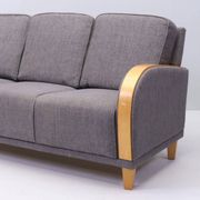 Three-seater Art Deco style sofa in grey fabric and curved wood.