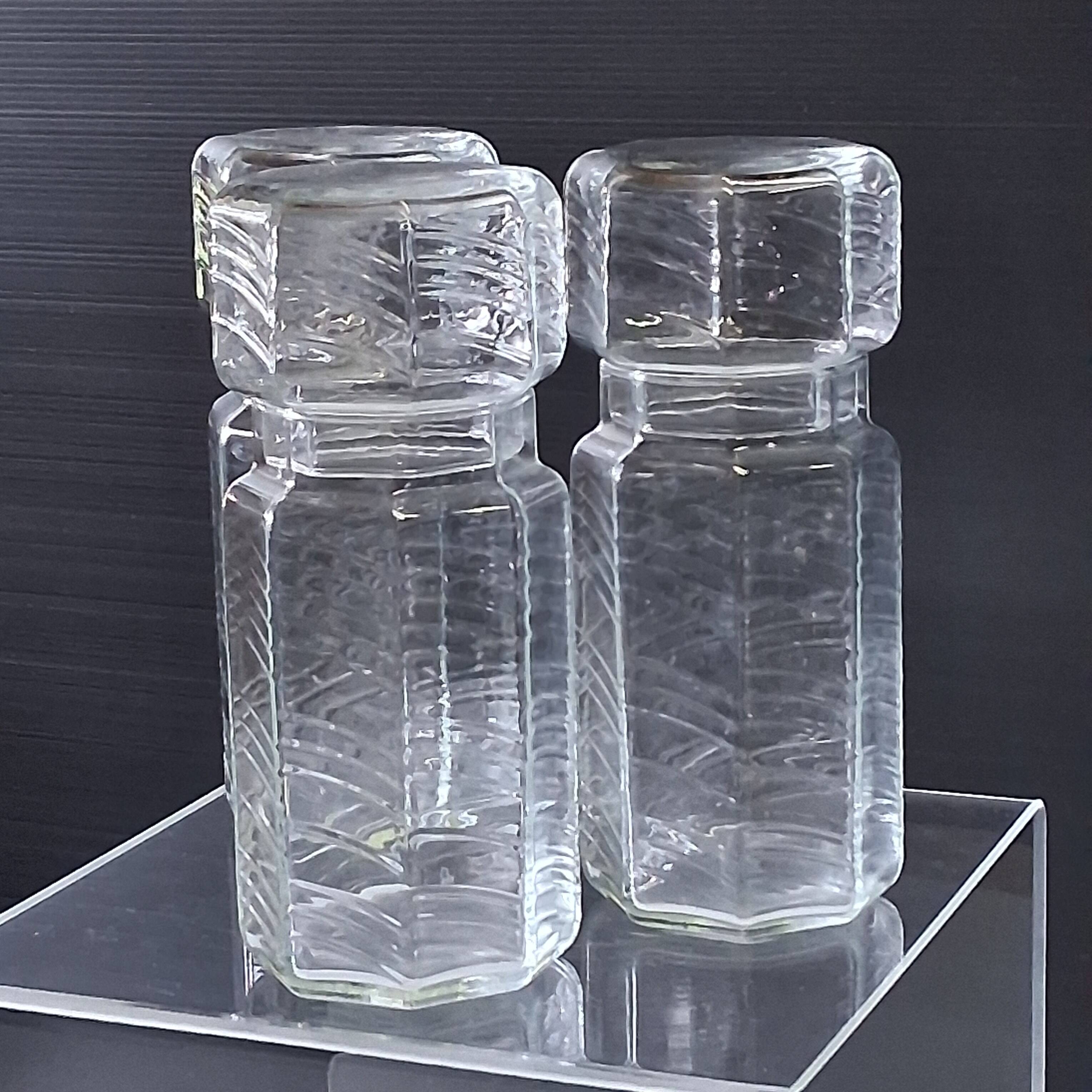 Set of 3 glass jars with old transparent lids in very good condition.
