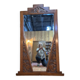 Art deco mirror in carved walnut