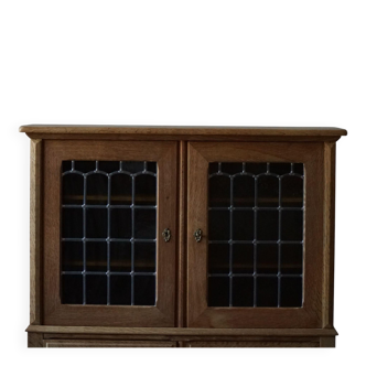 20th-century mid-century solid oak sideboard with glass front, by a Danish cabinetmaker.