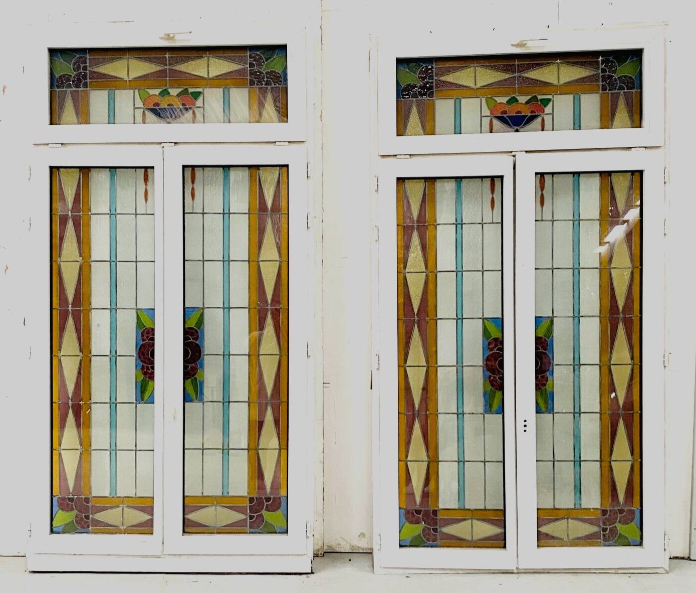 Pair of two-leaf windows in 20th century Art Deco stained glass