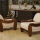 Brutalist pair of armchairs in mahogany and cream boucle 1970s.