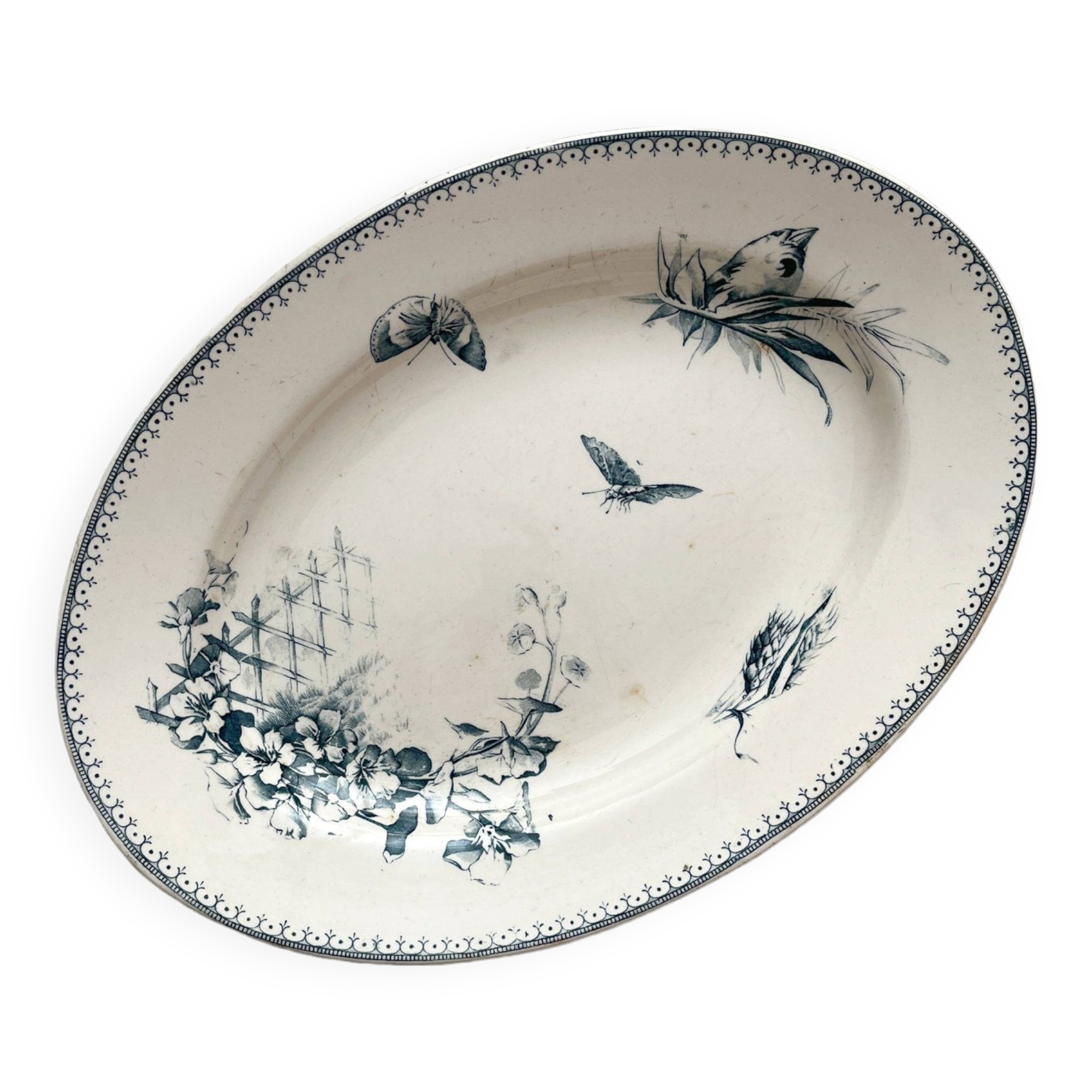 Oval ironstone dish with flowers and birds "Malaga" Petrus Regout