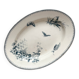 Plat ovale en terre de fer fleurs oiseaux "Malaga" Petrus Regout
