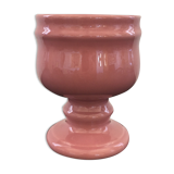 Pink flowerpot on stand