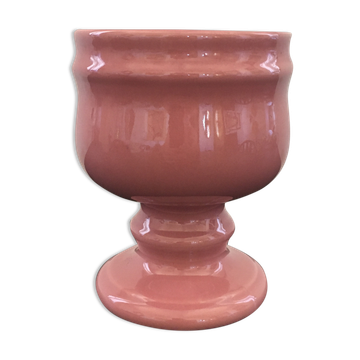 Pink flowerpot on stand