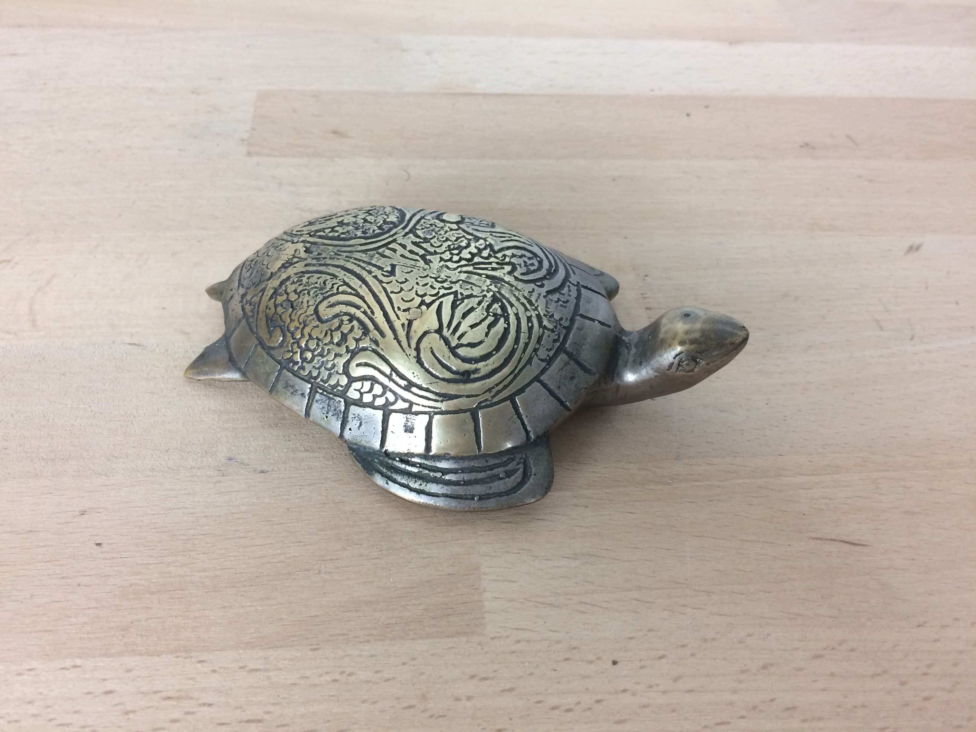 Turtle brass paper press