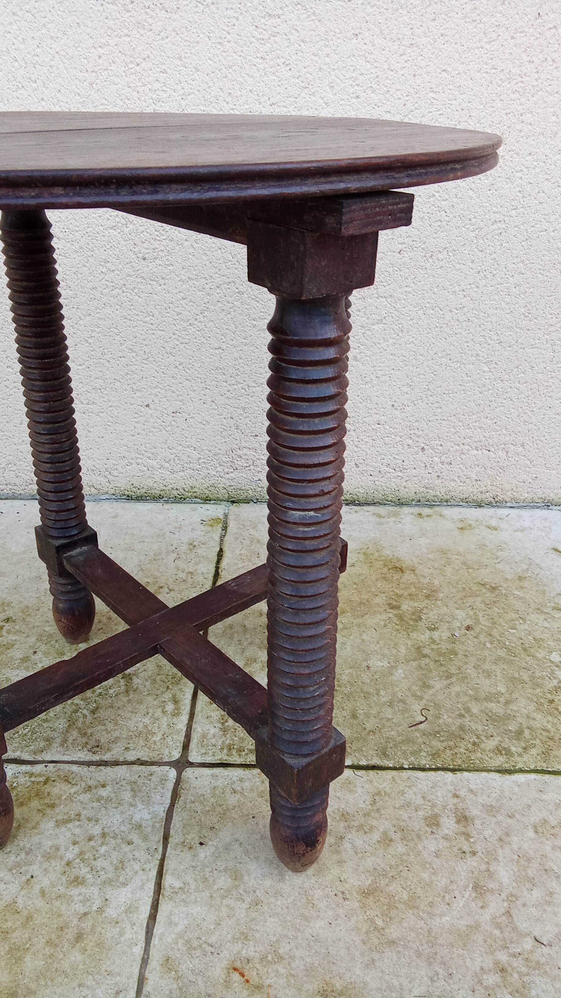 Old small round side table in Dudouyt style