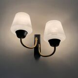 Pair of vintage Maison Arlus wall lights from the 1950s in brass, glass globe.
