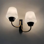 Pair of vintage Maison Arlus wall lights from the 1950s in brass, glass globe.