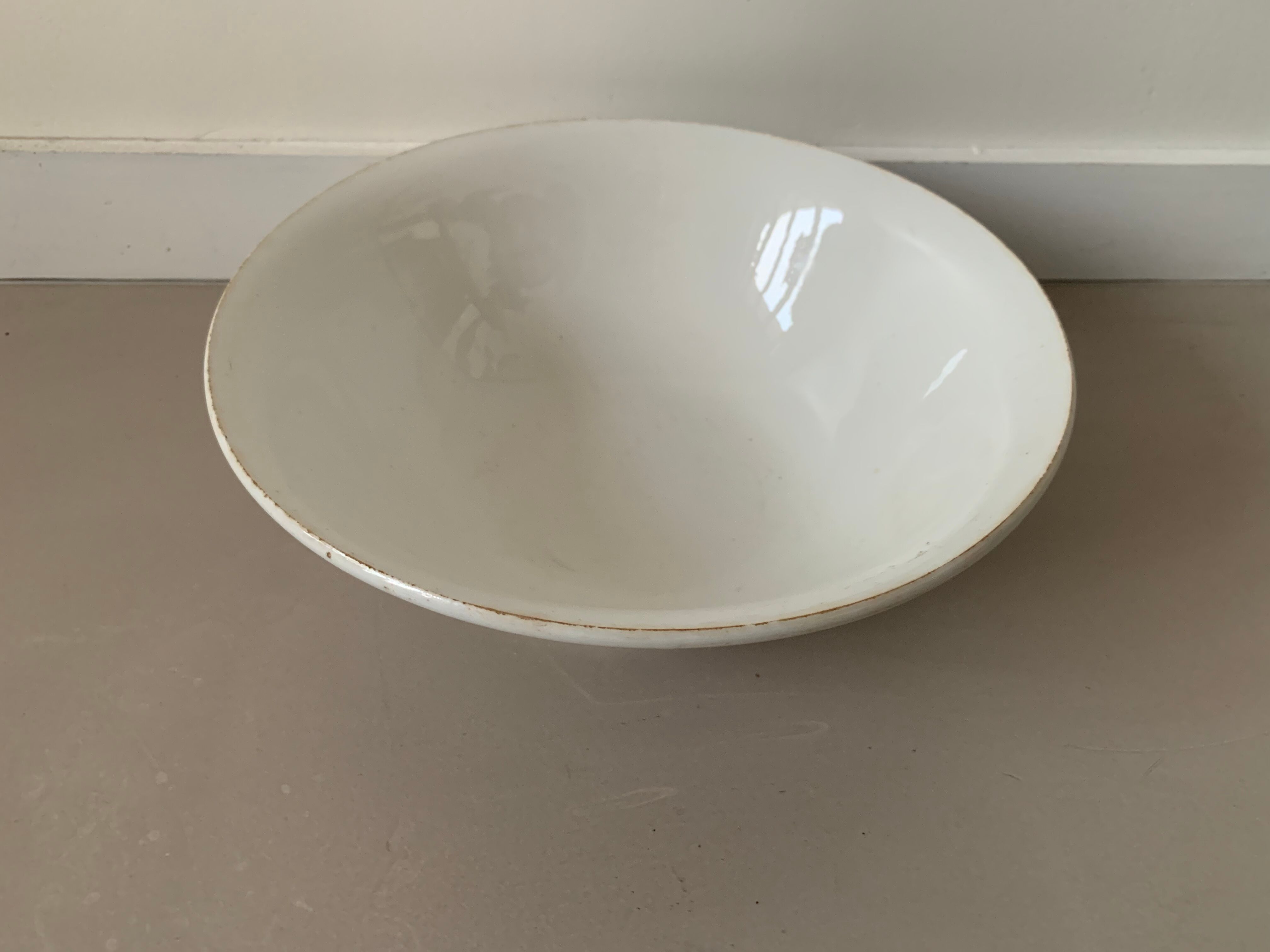 Old white salad bowl