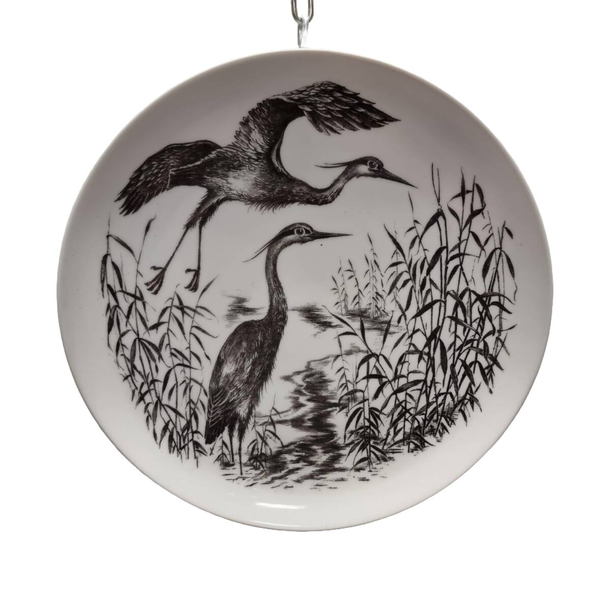 Vintage wall plate with herons
