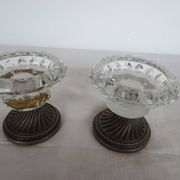 Two candle holders in bronze and crystal