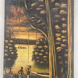 Old african canvas under lively woods in tropical and lush forest signed to identify