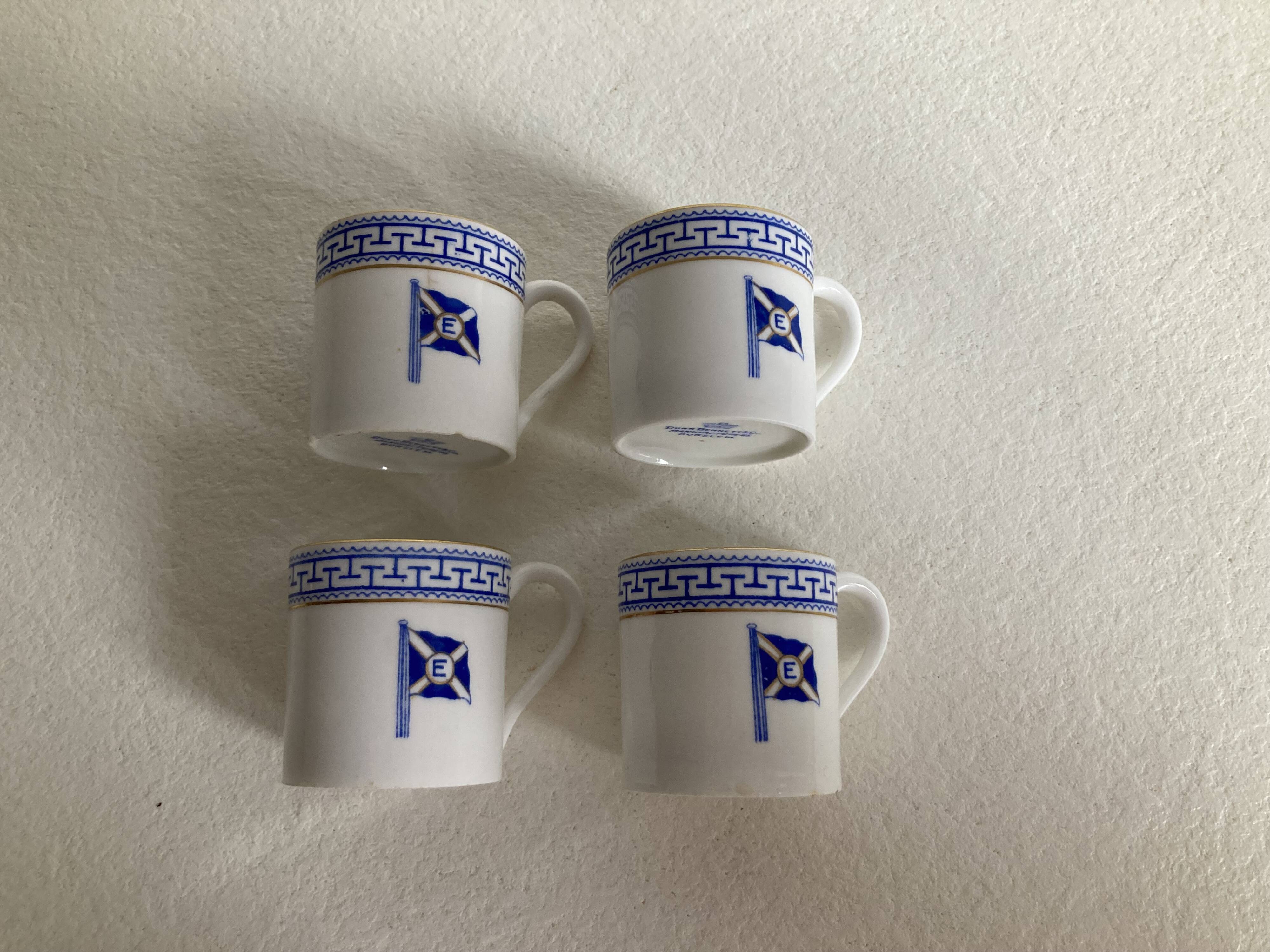 4 coffee cups and saucers