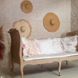 Carved wooden bench and caning bed
