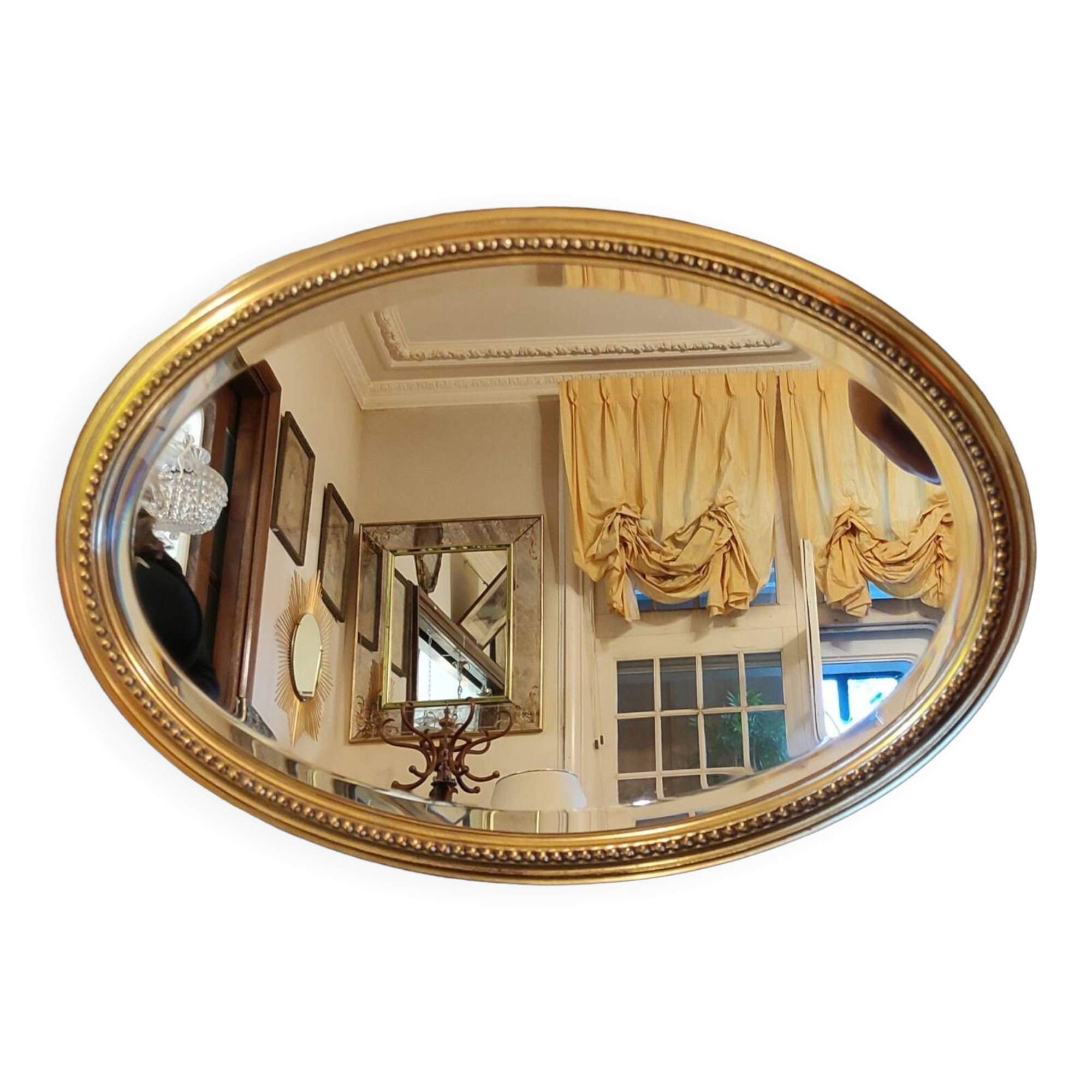 Old oval beveled golden mirror