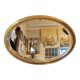 Old oval beveled golden mirror