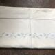 Antique embroidered linen with a floral motif