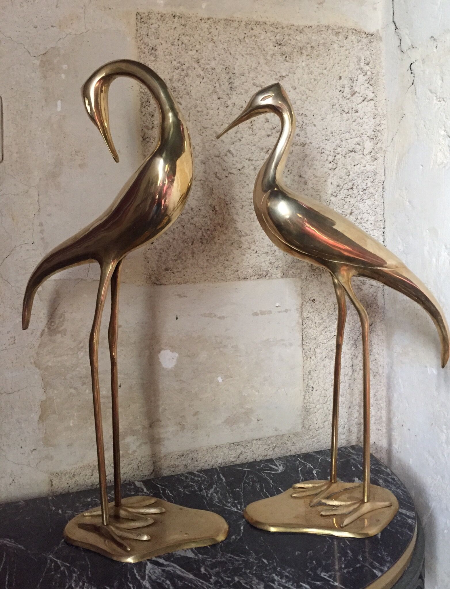 Pair of herons in brass