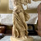 "Winged Victory of Samothrace", beige plaster statuette