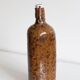 Bouteille en grès pyrité