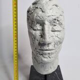 Clay sculpted head on marble base, 32 cm