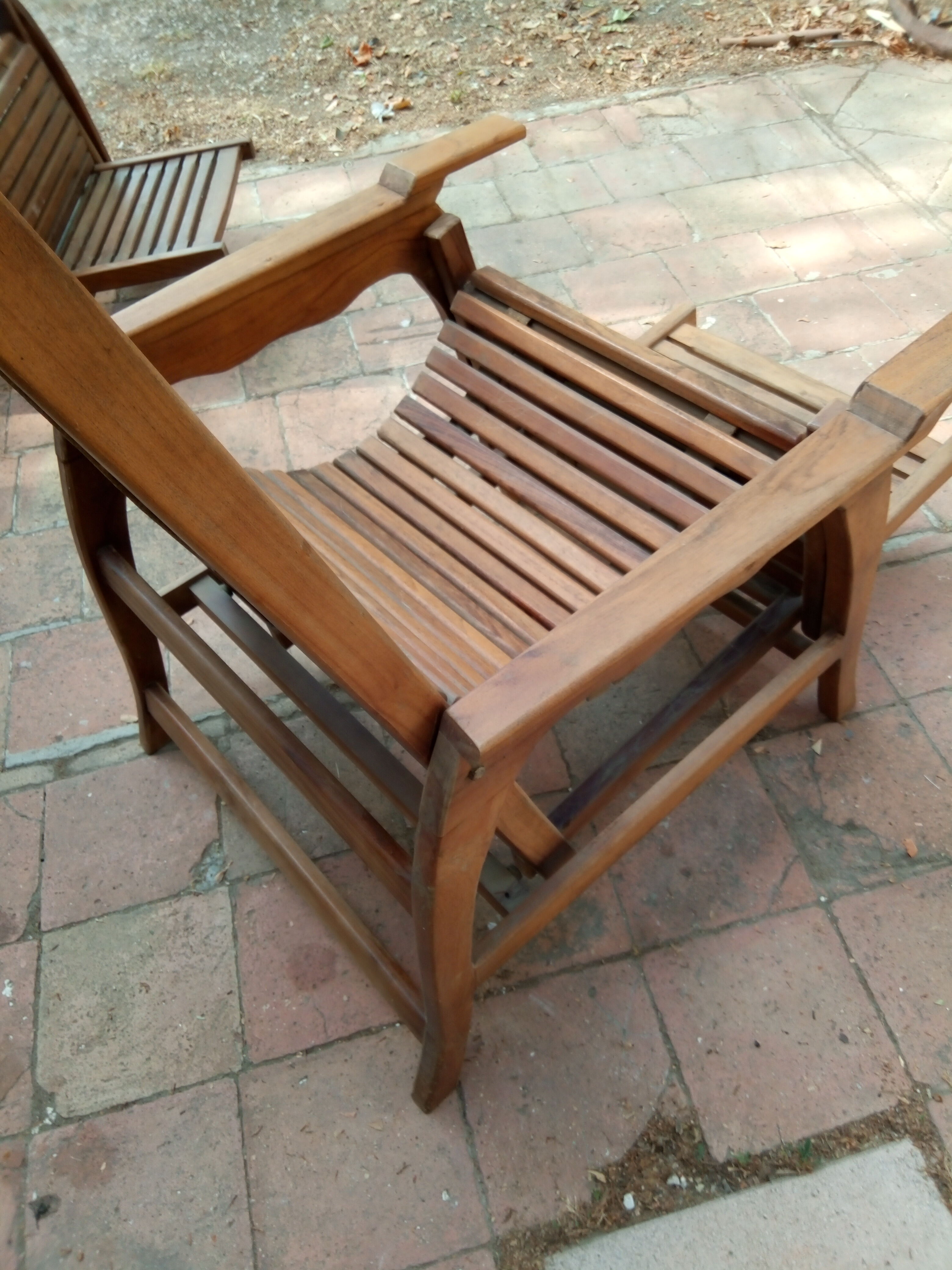 Teak stretchy long chair.