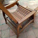 Teak stretchy long chair.