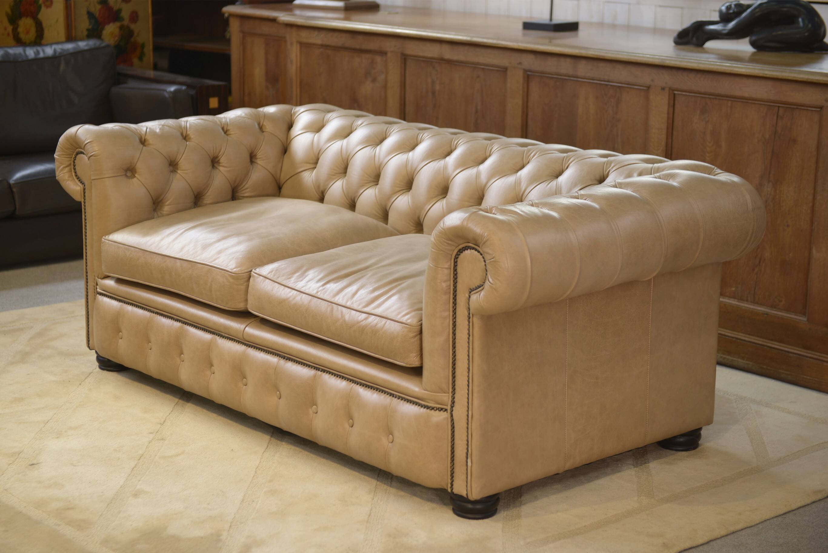 Beige leather Chesterfield sofa handmade in England.