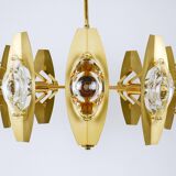 Oscar Torlasco brass chandelier of 25 inches with optical prism lenses, Italy, 1970s.