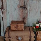 Old suitcase in canvas, wood and metal