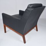 Leather armchair and footstool by Kai Lyngfeldt-Larsen. Denmark 1960s