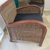 2 colonial-style armchairs in woven rattan and exotic wood