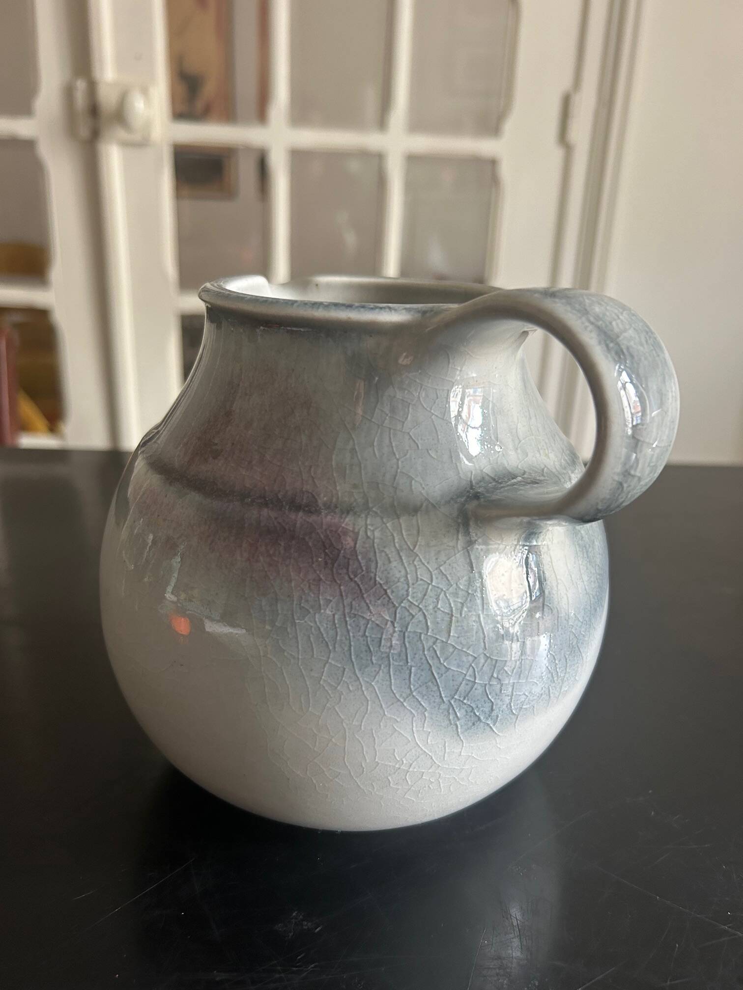 large blue ceramic pitcher