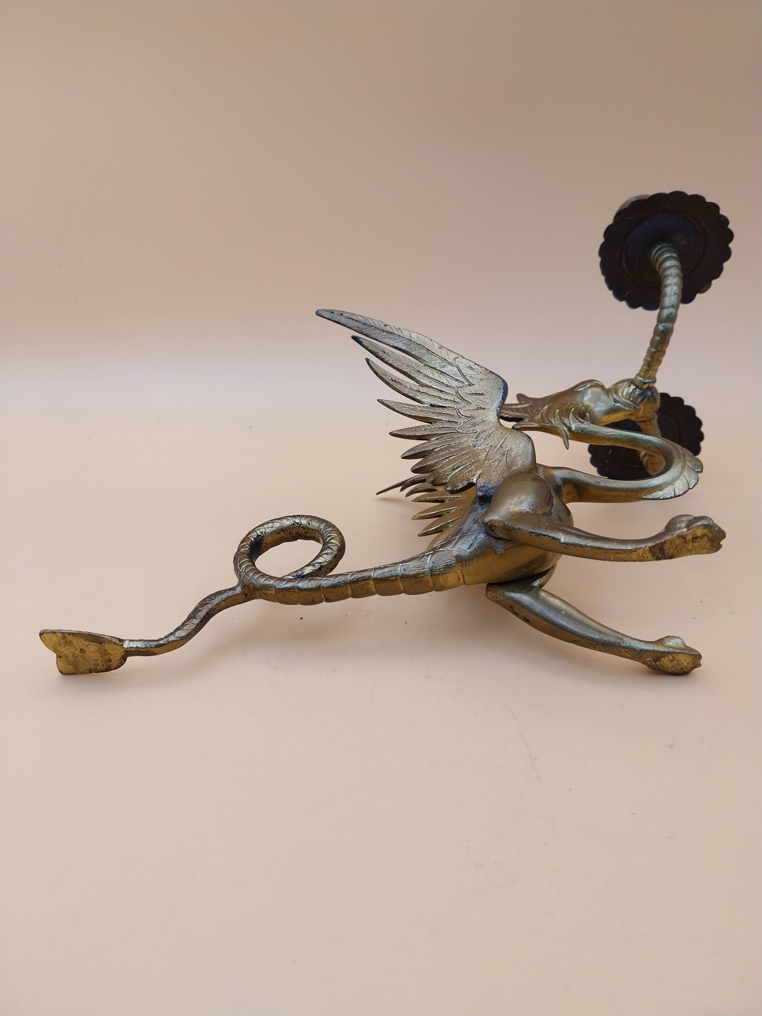 Pair of bronze candlesticks with chimera dragons