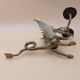 Pair of bronze candlesticks with chimera dragons