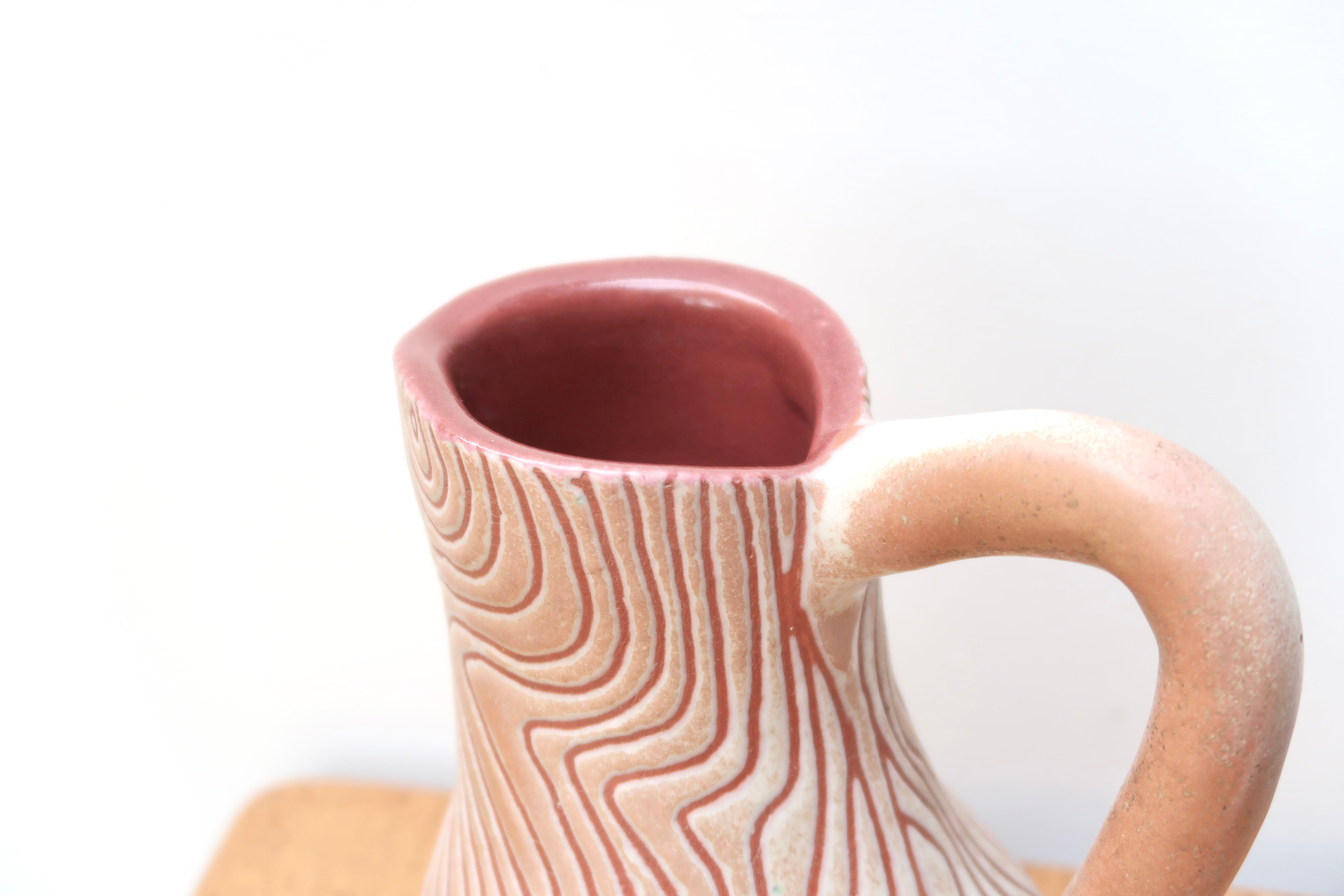 Pink scarified pitcher by Henry Algan, 60s