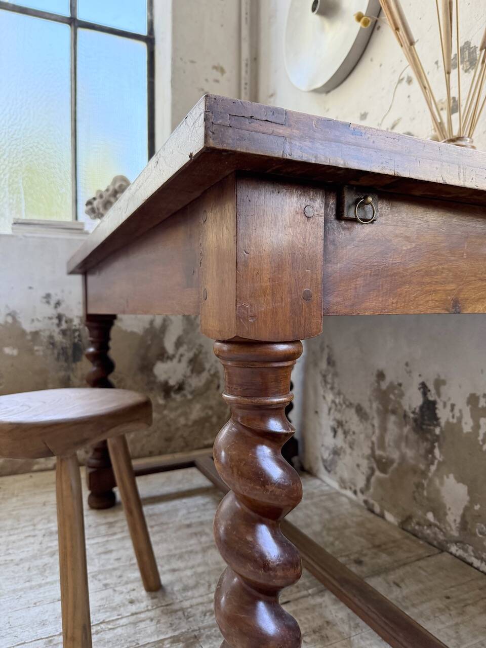 Paneled walnut desk with turned legs, 1900