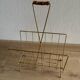 Magazine rack in gold metal and bamboo from the 60s