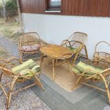 4 armchairs and a coffee table made of rattan and bamboo wood, vintage.