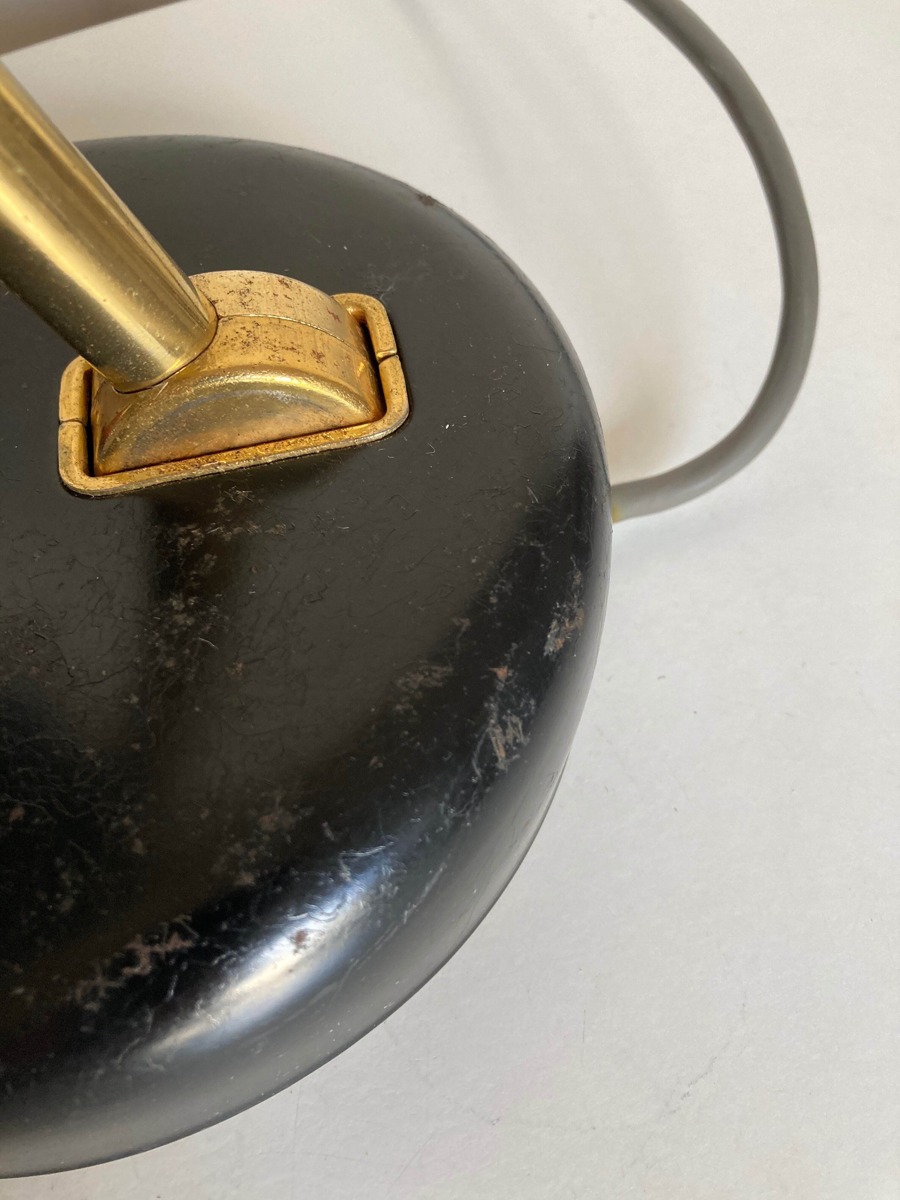 1960 black sheet metal and brass orientable lamp