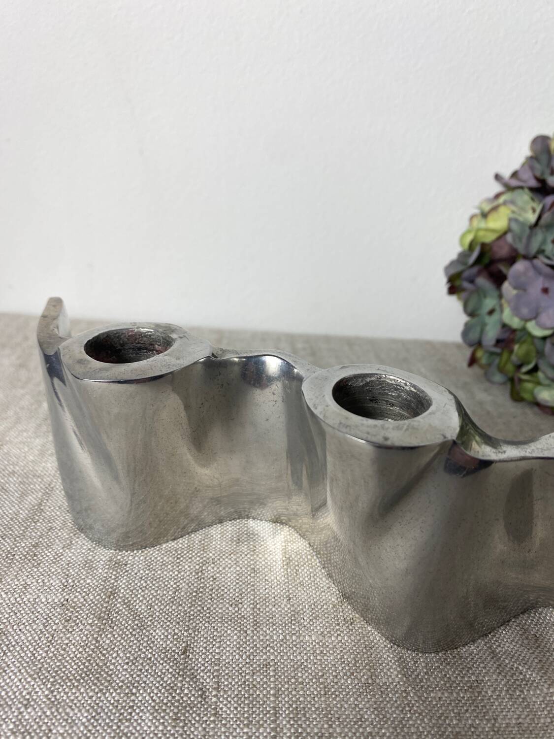 Brushed aluminum candle holder