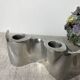 Brushed aluminum candle holder