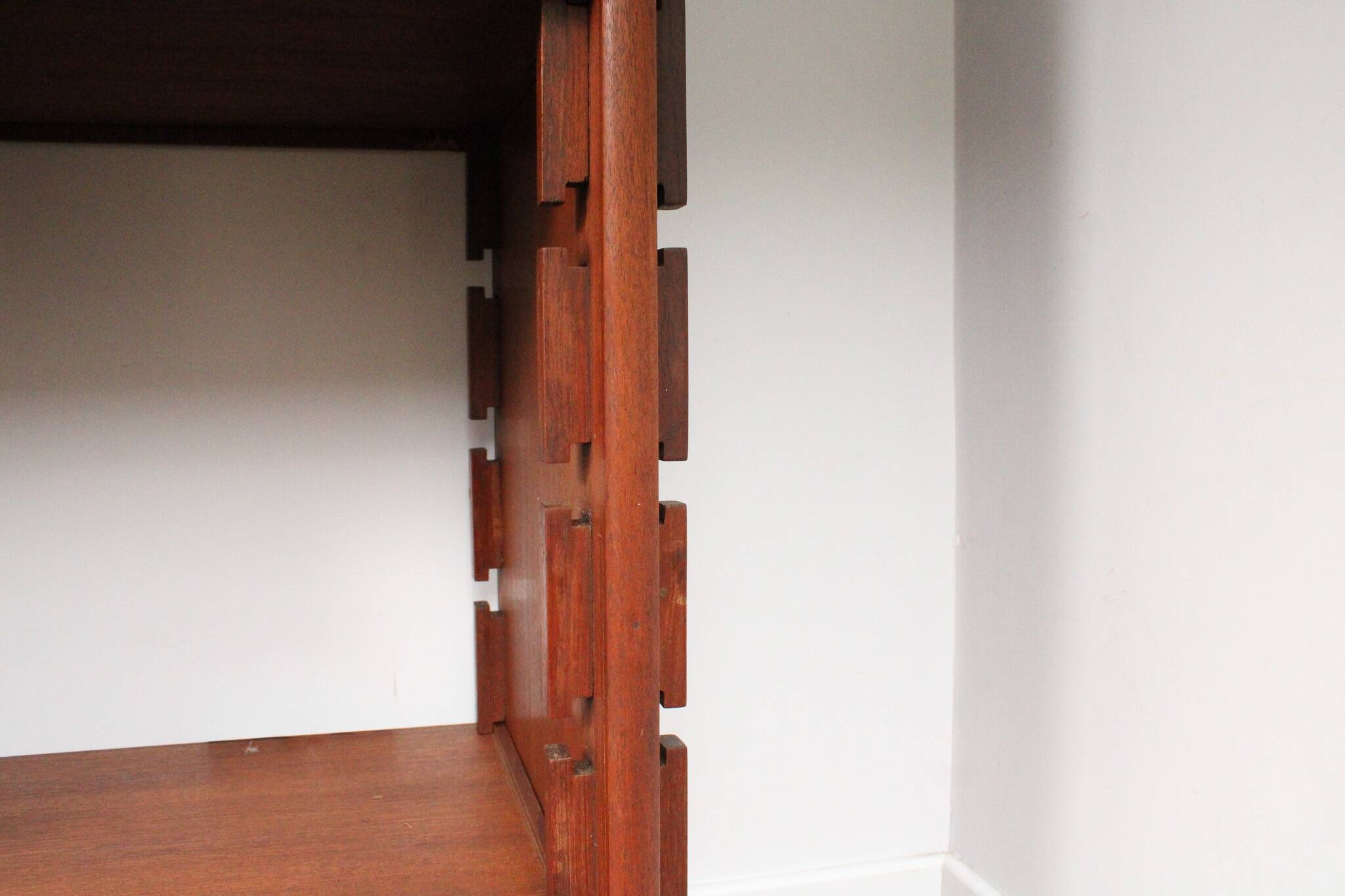 A vintage mid-century teak Gianfranco Frattini style bookcase room divider